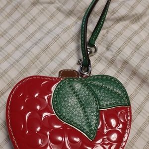 Coach Embossed Apple wristlet